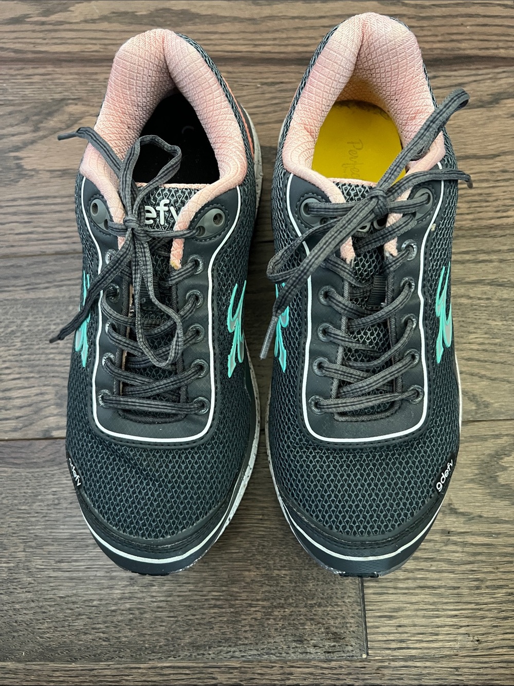 Ryka Black Athletic Sneakers with Pink Lining and Teal Accents